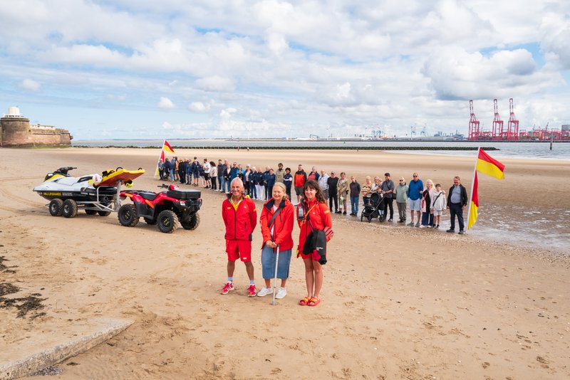 42 people lined New Brighton Beach as RNLI celebrates 25 years of lifeguards